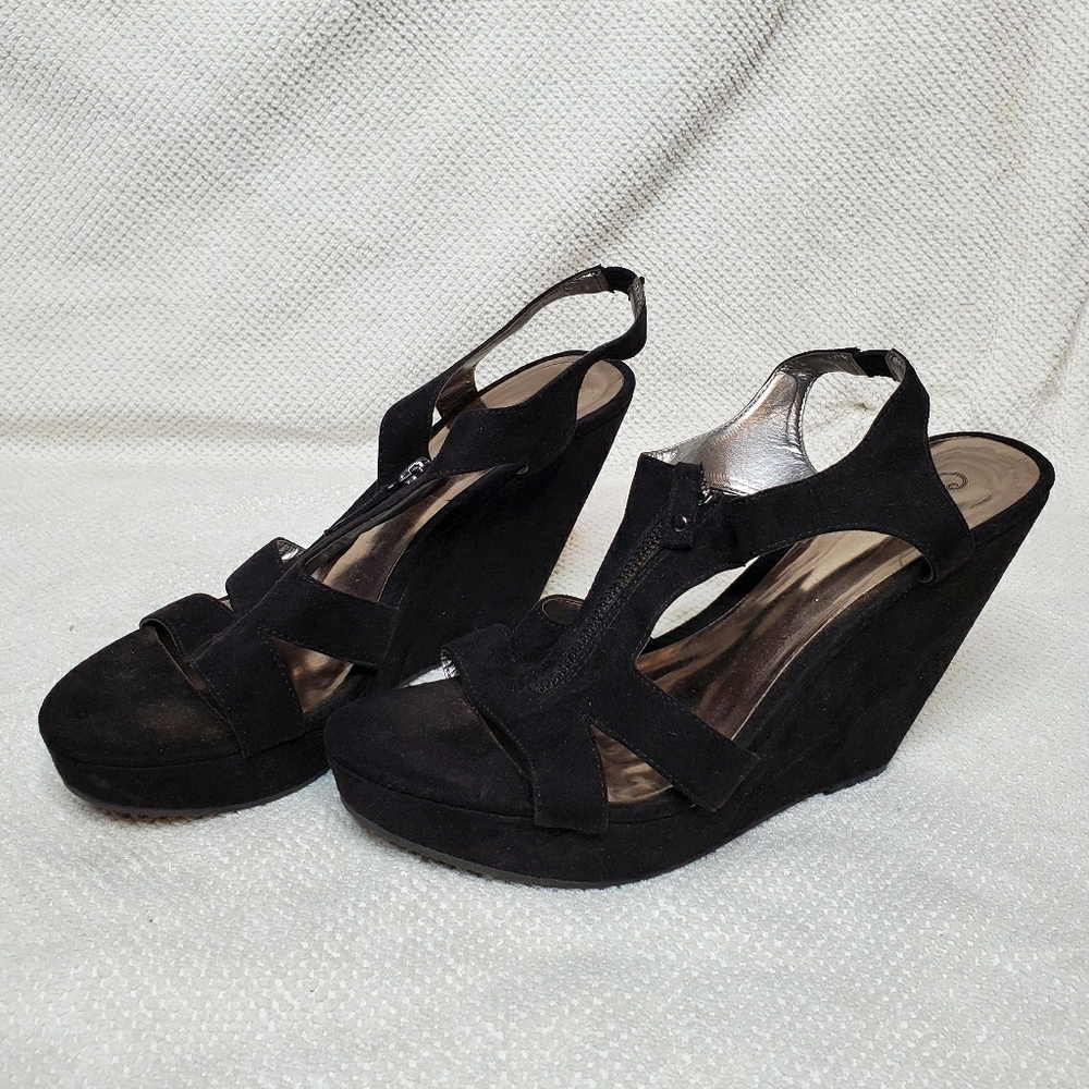 Carlos Santana black wedges